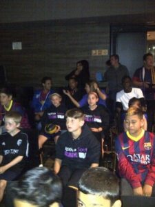 Bella Sember watching FC Barcelona.