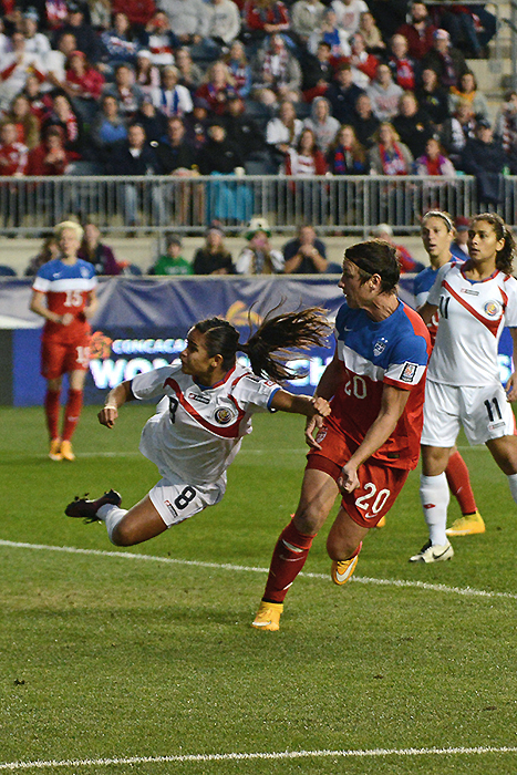The USWNT's Abby Wambach scores one of her four goals on the night.