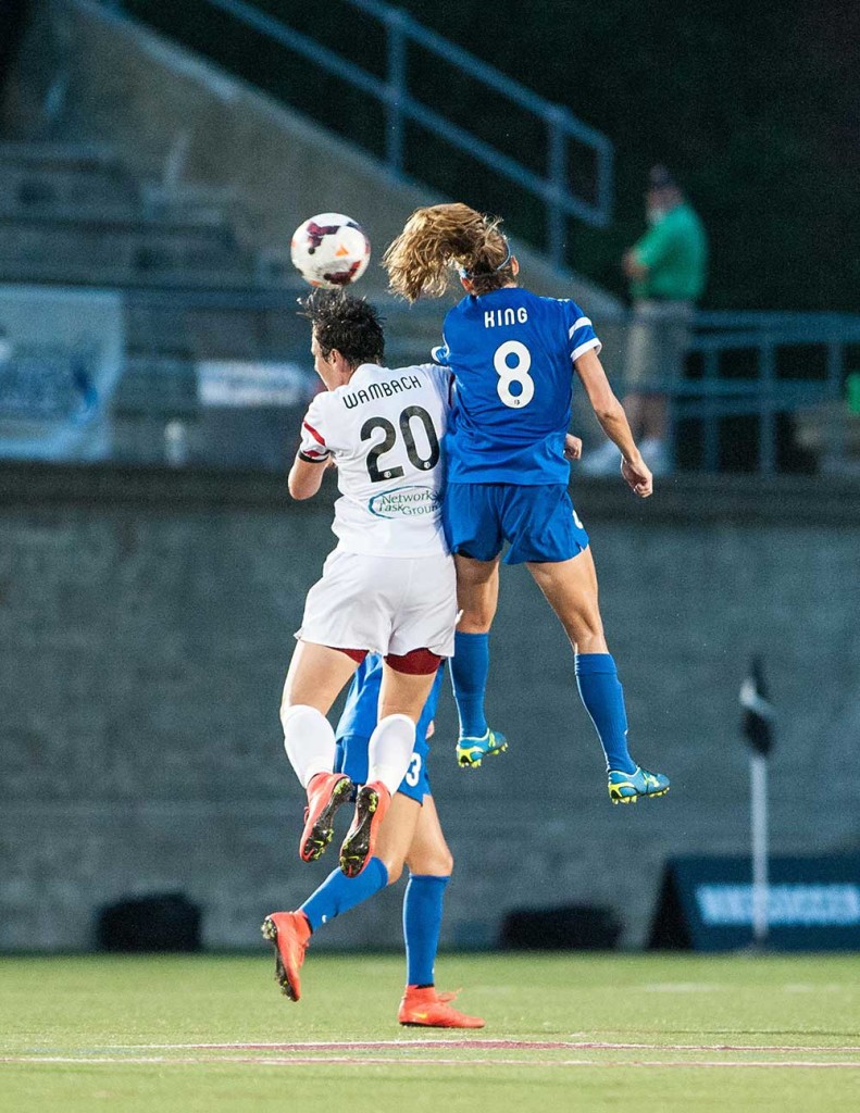 Julie King of the Boston Breakers battles Abby Wambach of the Western New York Flash.
