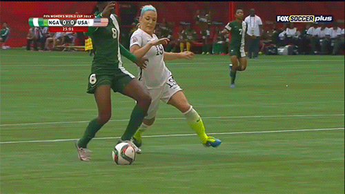 Julie Johnston times her tackle to deny Asisat Oshoala.
