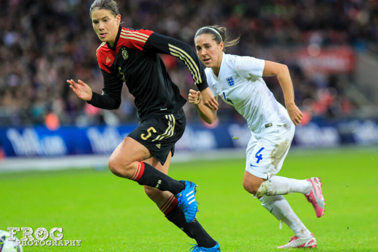 Gemany's Annike Krahn and England's Fara Williams at Wembley Stadium on November 23, 2014.