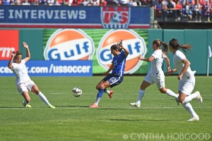 Christen Press (23) maneuvers agains New Zealand at Busch Stadium.