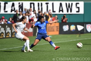 Ali Riley and Christen Press during a friendly at Busch Stadium on April 4, 2015.