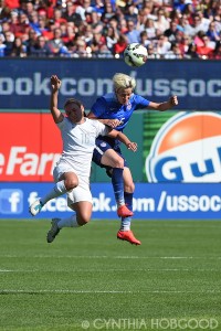 Annalie Longo and Megan Rapinoe battle for the ball during a friendly on April 4, 2015.