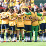 The Colombian team huddles before its match against the USA in the 2015 FIFA Women's World Cup.