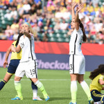 USA's Julie Johnston (19) and Alex Morgan react during the match.
