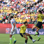 Colombia's Nataly Arias heads the ball