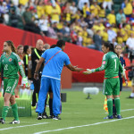 Colombian goalkeeper Catalina Pérez (22) walks off the pitch after being ejected. Substitue keeper Stefany Castaño prepares to come on.