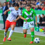 PSG's Kenza Dali and Wolfsburg's Noelle Maritz vie for the ball.