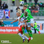 Caroline Seger (PSG), Martina Müller (25), and Alex Popp (right) challenge for the ball.