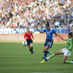 Mexico's Christina Murillo (3) goes in for the tackle against USA's Christen Press (23).
