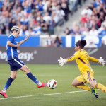 Megan Rapinoe challenges Cecilia Santiago during the USA-Mexico international friendly on May 17, 2015.