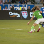 Alina Garcíamendez and Abby Wambach battle for the ball during the USA-Mexico friendly.