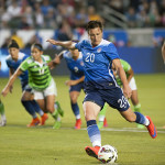 Abby Wambach takes the penalty.