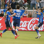 The USA's Sydney Leroux, Abby Wambach, and Morgan Brian celebrate a goal.