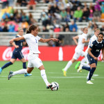 England's Alex Scott looks to attack.