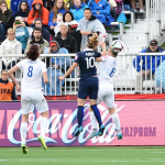 Camille Abily and Laura Bassett.