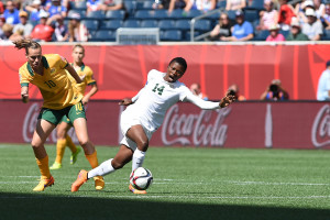 Nigeria's Evelyn Nwabuoku is fouled by Australia's Emily van Egmond.