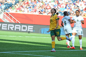 Sam Kerr celebrates after assisting on Kyah Simon's second goal of the match.