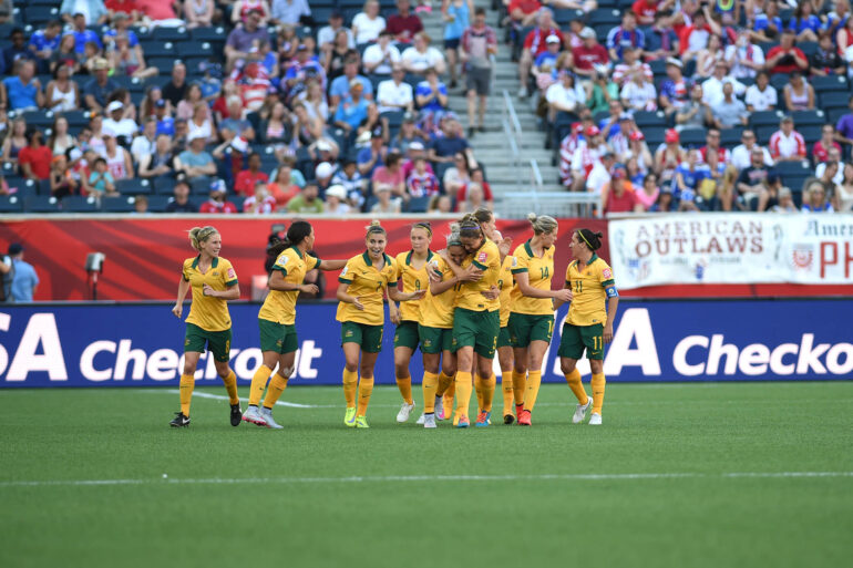 Australia celebrates Kyah Simon's second-half goal in a Group D match against Nigeria.