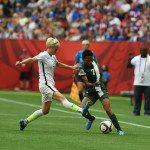 USA's Megan Rapinoe and Nigeria's Esther Sunday.