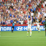 USA's Meghan Klingenberg and Becky Sauerbrunn celebrate the win over Nigeria.