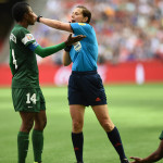 Nigeria's Evelyn Nwabuoku confers with the referee.