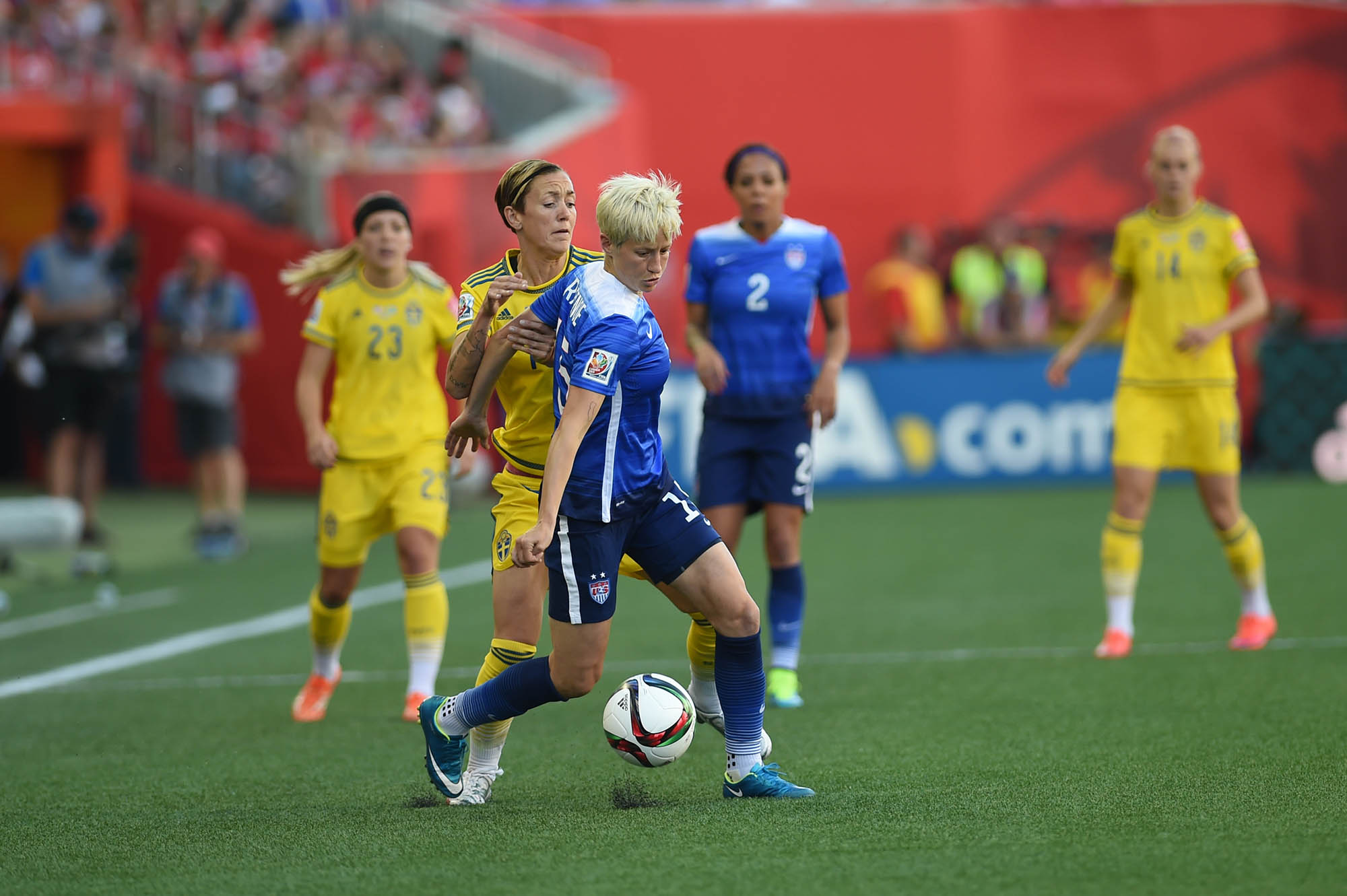 Sweden's Therese Sjögran and USA's Megan Rapinoe.