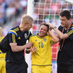 Sweden's Jessica Samuelsson after a collision with USA's Carli Lloyd.