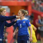 USA's head coach Jill Ellis instructs Amy Rodriguez.