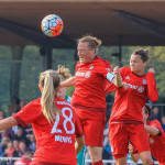 FC Bayern Munich's Melanie Behringer heads the ball.