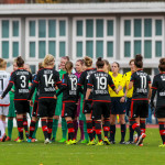 The teams shaking hands before the match.