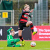 Daniela Schacher of SV Werder Bremen and Carolin Simon of Bayer 04 Leverkusen.