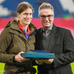 Kerstin Garefrekes is honored for appearing more than 100 times for Germany.