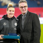 Anja Mittag is honored for amassing more than 100 caps for Germany.