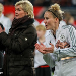 Anja Mittag cheering on Célia Šašić.