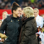 Célia Šašić and Silvia Neid share a moment.