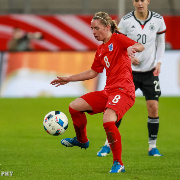 Jordan Nobbs controls the ball.