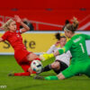 Karen Bardsley (ENG) saves a shot by Felicitas Rauch (GER).