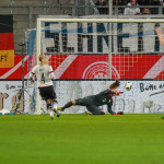 Laura Benkarth (GER) makes a save.