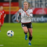 Tabea Kemme (GER) runs down the ball.