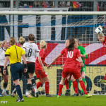 Stephanie Houghton (ENG) clears the ball.