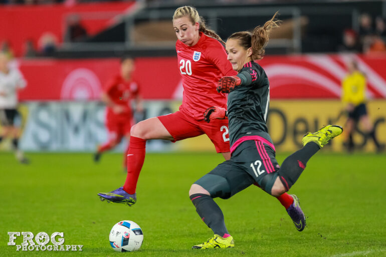 Toni Duggan (ENG) challenges Laura Benkarth (GER).