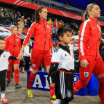 England walking out of the tunnel.