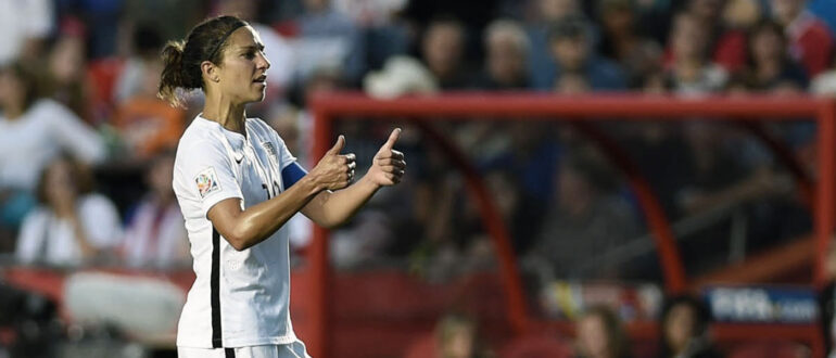 Carli Lloyd giving a thumbs-up.