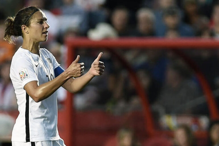 Carli Lloyd giving a thumbs-up.