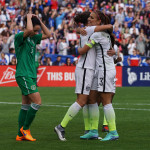 Alex Morgan congratulating Carli Lloyd on her goal.