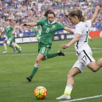 Tobin Heath lines it up.