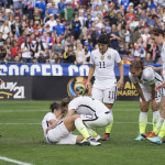 Teammates check on Carli Lloyd.