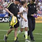 The aftermath of Carli Lloyd's collision with a player from Ireland.